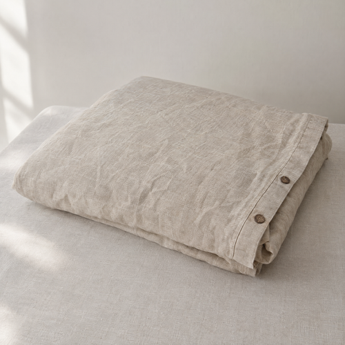 Oat stonewashed linen duvet cover, folded