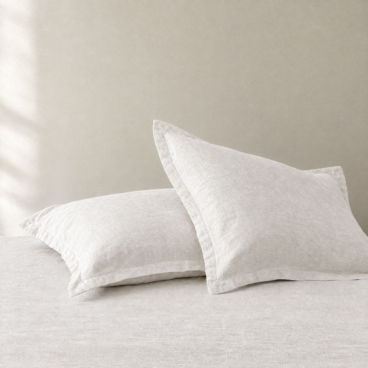 Pair of stonewashed linen pillowcases in Chalk with flat flange