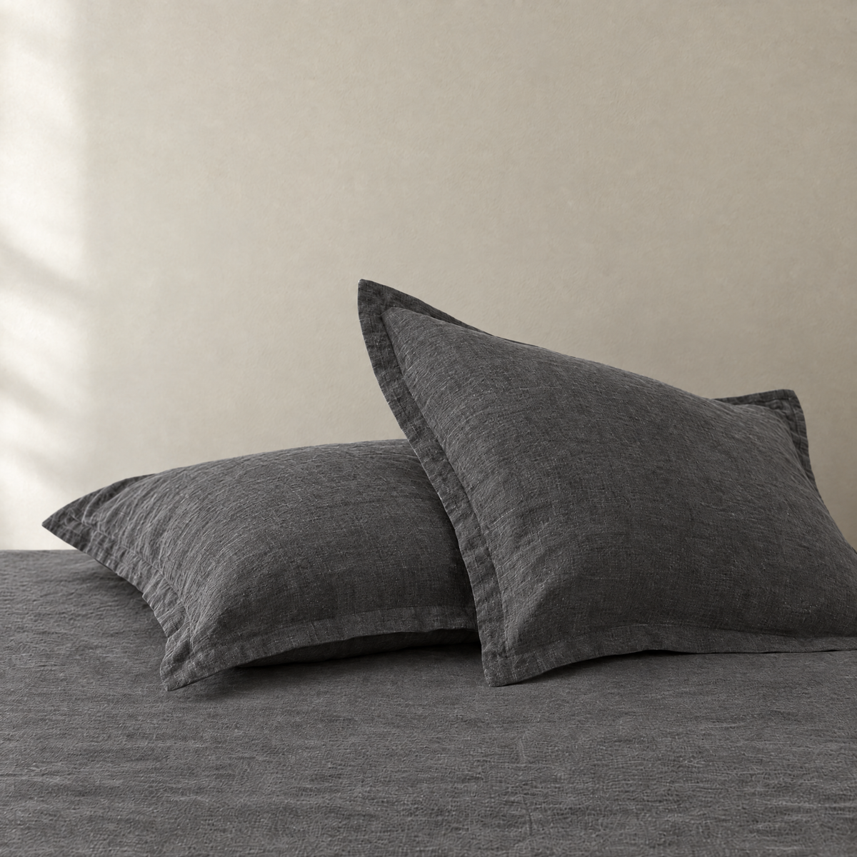 Pair of stonewashed linen pillowcases in Charcoal with flat flange
